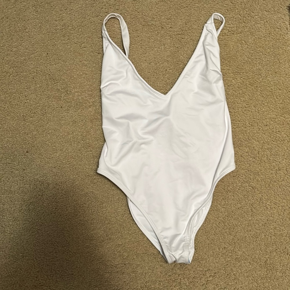 White open-back bathing suit